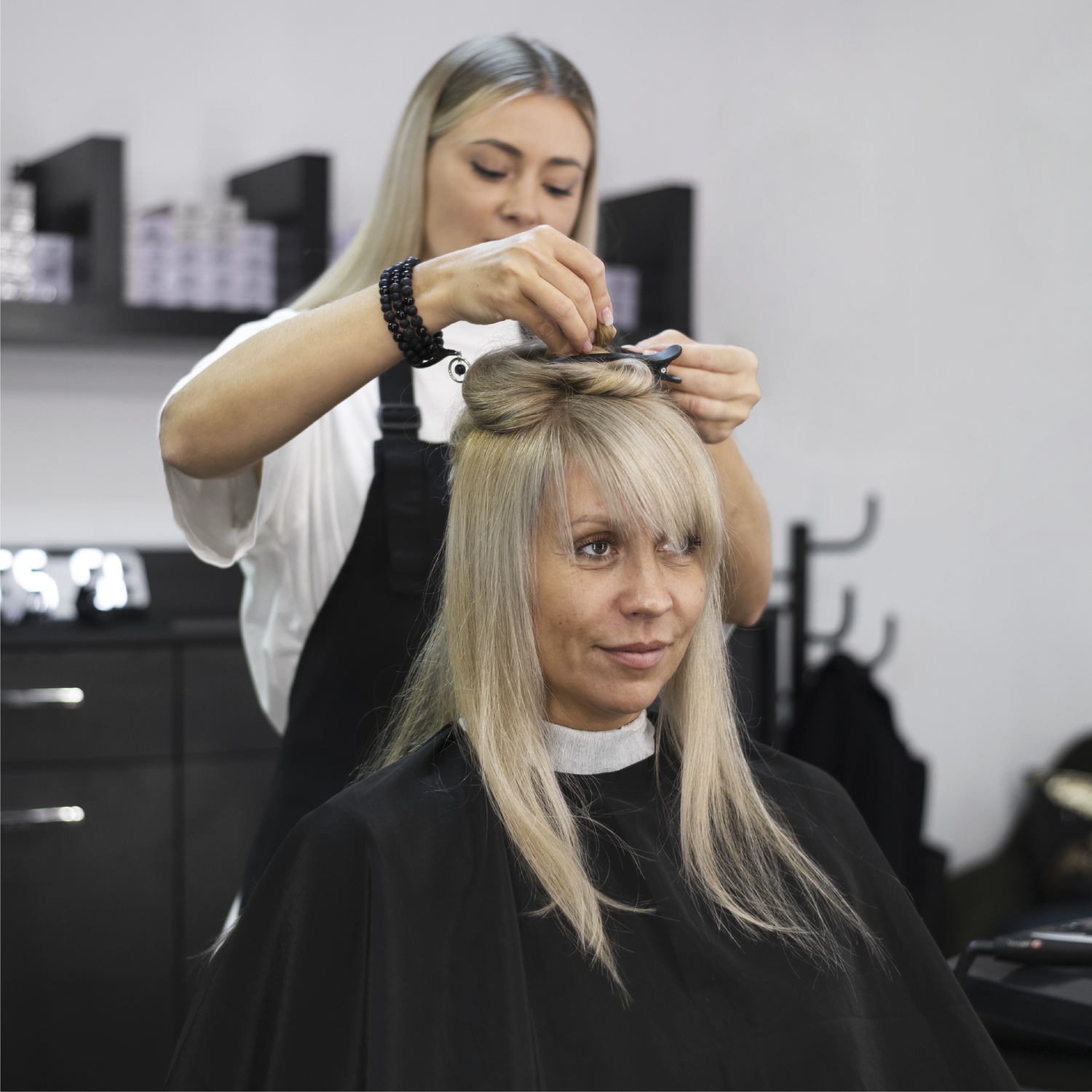 woman styling hair 